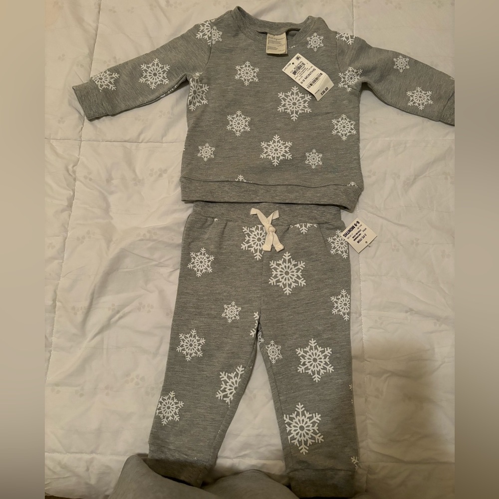 Brand new with tags baby boy gray and white sweatsuit size 6 months.
